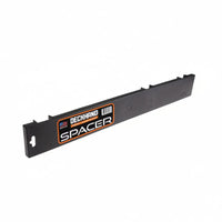Black plastic spacer with branding on a white background